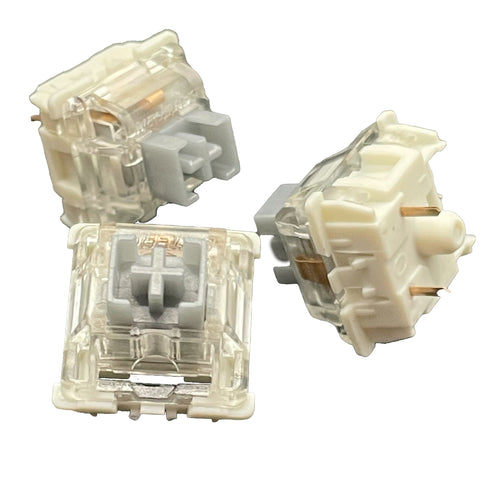 Three Gateron SMD Silver Pro switches arranged together, showcasing multiple viewing angles.